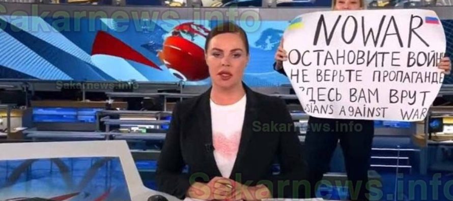 Журналистка протестира в ефир на руска телевизия (обновена)